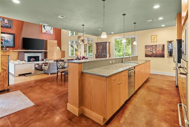 6209 Ledge Mountain Dr, Austin, TX 78731 - kitchen featuring dishwasher, recessed lighting, a large island, light stone counters, and hanging light fixtures