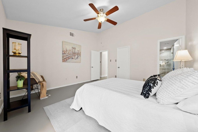 bedroom featuring baseboards, visible vents, ceiling fan, and ensuite bath