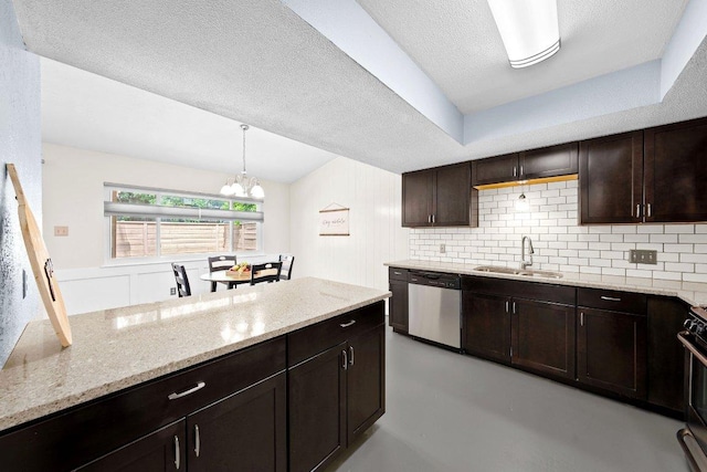 kitchen featuring dark brown cabinetry, light stone countertops, dishwasher, and a sink