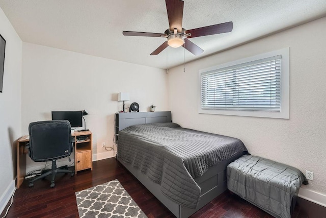 3815 Guadalupe St Unit 103, Austin, TX 78751 - bedroom with wood finished floors, a desk, and ceiling fan