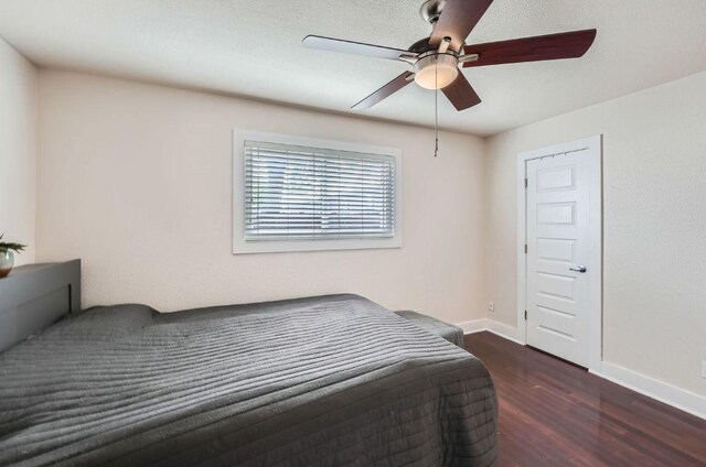3815 Guadalupe St Unit 103, Austin, TX 78751 - bedroom with wood finished floors and ceiling fan