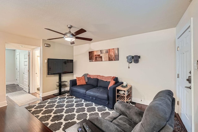 3815 Guadalupe St Unit 103, Austin, TX 78751 - living area featuring ceiling fan, wood finished floors, and a textured ceiling
