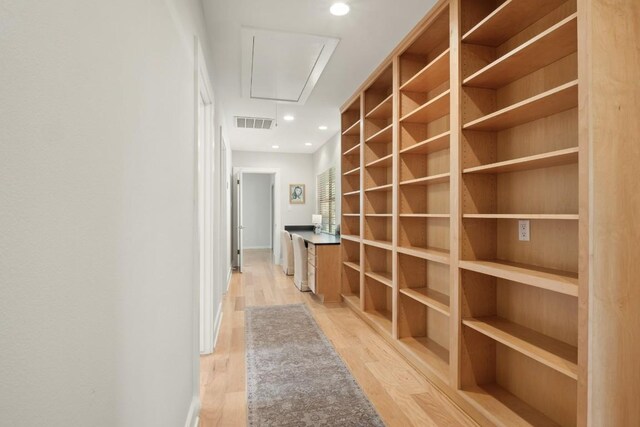 2213 Rebel Rd, Austin, TX 78704 - hallway with attic access, light wood-style flooring, visible vents, and recessed lighting