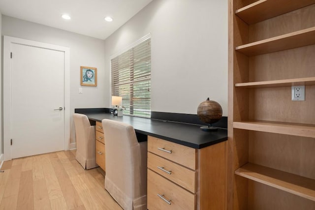2213 Rebel Rd, Austin, TX 78704 - home office with recessed lighting, built in study area, and light wood-style floors
