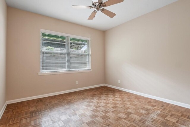 2213 Rebel Rd, Austin, TX 78704 - spare room with baseboards and ceiling fan