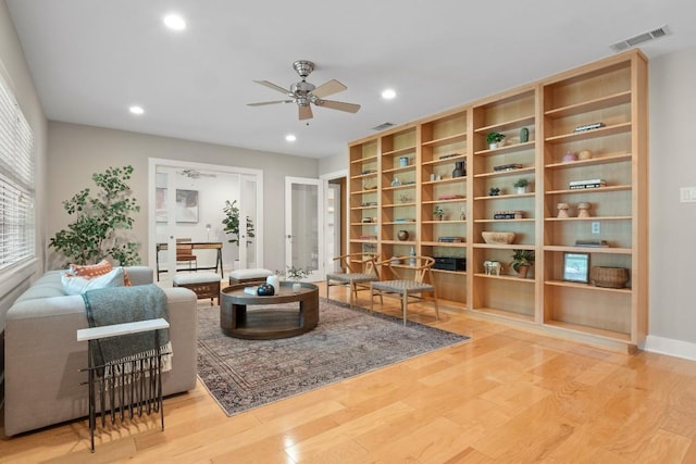 2213 Rebel Rd, Austin, TX 78704 - living area featuring visible vents, recessed lighting, built in features, a ceiling fan, and wood finished floors