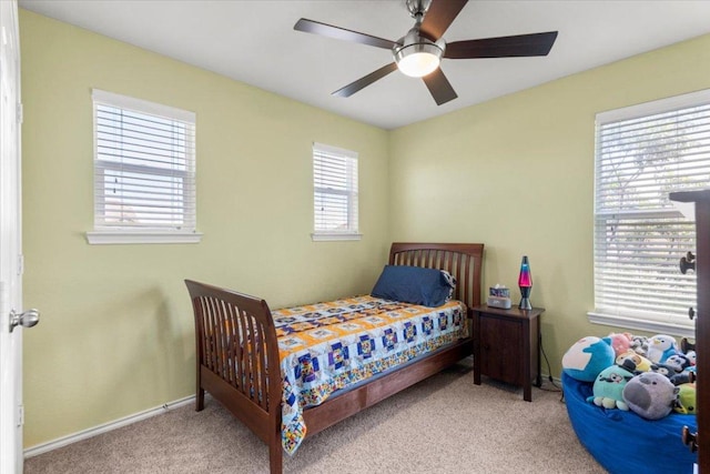 30305 Tiger Woods Dr, Georgetown, TX 78628 - bedroom with carpet floors, ceiling fan, and baseboards