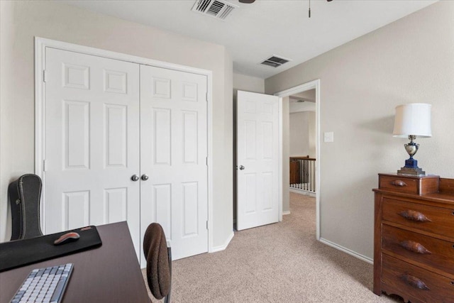 30305 Tiger Woods Dr, Georgetown, TX 78628 - home office with light carpet, baseboards, and a ceiling fan