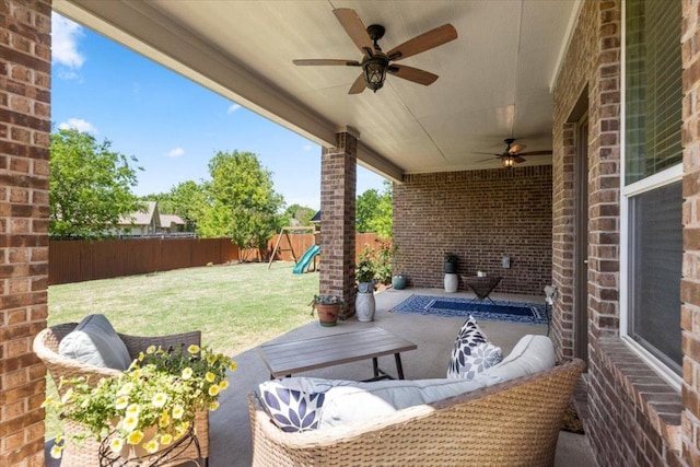 30305 Tiger Woods Dr, Georgetown, TX 78628 - view of patio with ceiling fan and outdoor lounge area