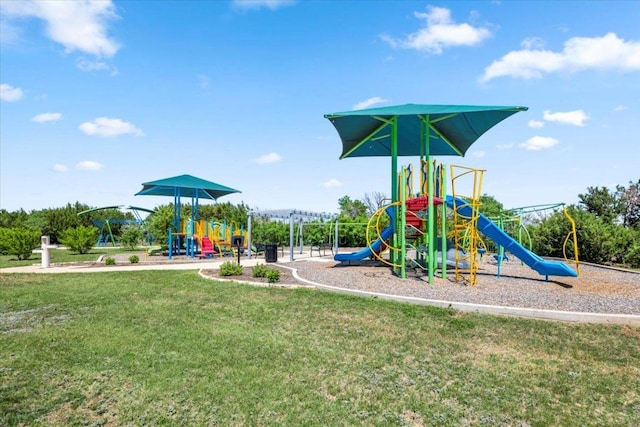 30305 Tiger Woods Dr, Georgetown, TX 78628 - community jungle gym featuring a yard