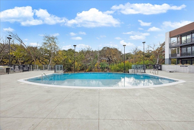 2209 S 1st St Unit 226, Austin, TX 78704 - community pool with view of wooded area
