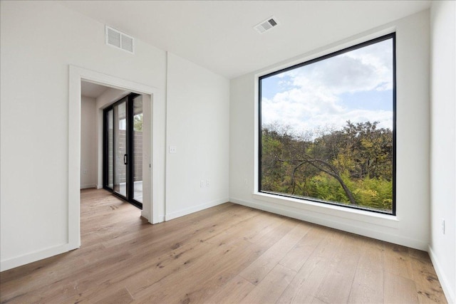 2209 S 1st St Unit 226, Austin, TX 78704 - spare room with light wood-style floors and baseboards