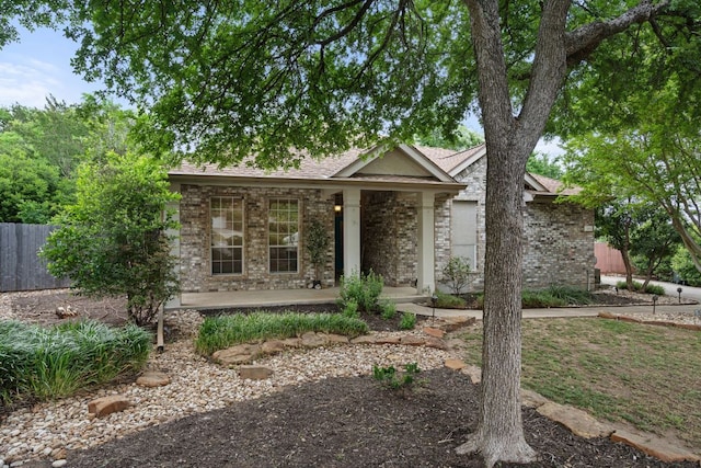 2812 Cascade Falls Dr, Austin, TX 78738 - view of front of property featuring brick siding and roof with shingles