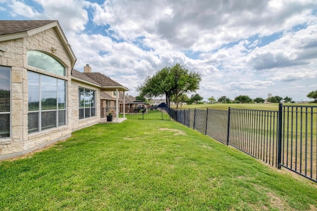 view of yard featuring a fenced backyard