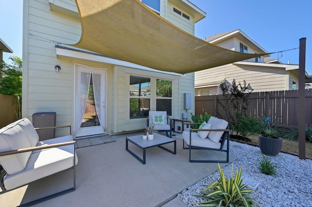 view of patio / terrace with fence and outdoor lounge area