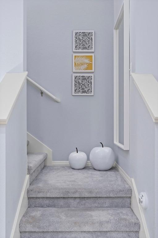 staircase with baseboards