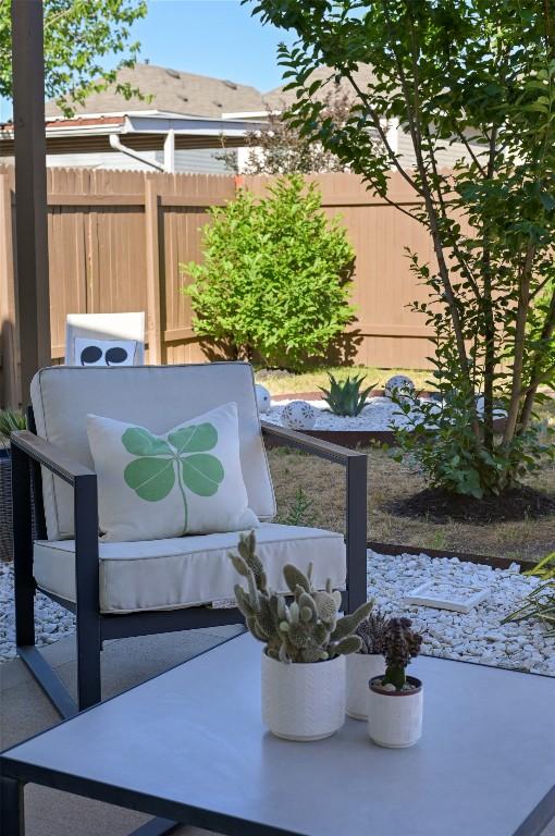 view of patio / terrace featuring fence