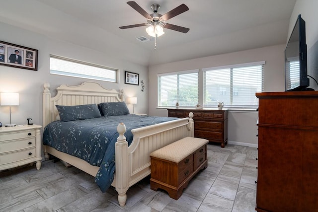 bedroom with baseboards, a ceiling fan, and visible vents
