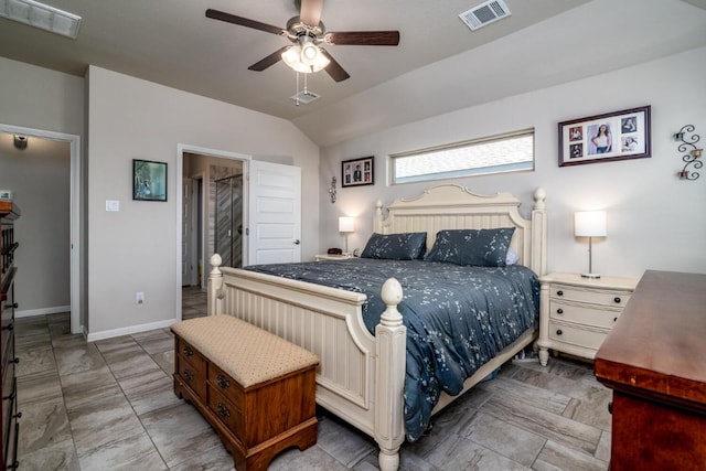 bedroom with lofted ceiling, baseboards, and visible vents