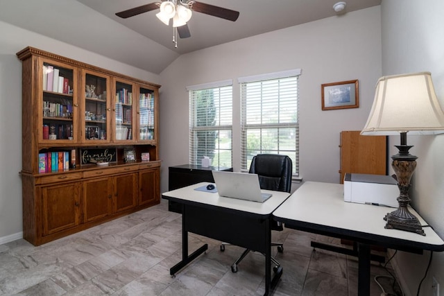 office featuring lofted ceiling and a ceiling fan