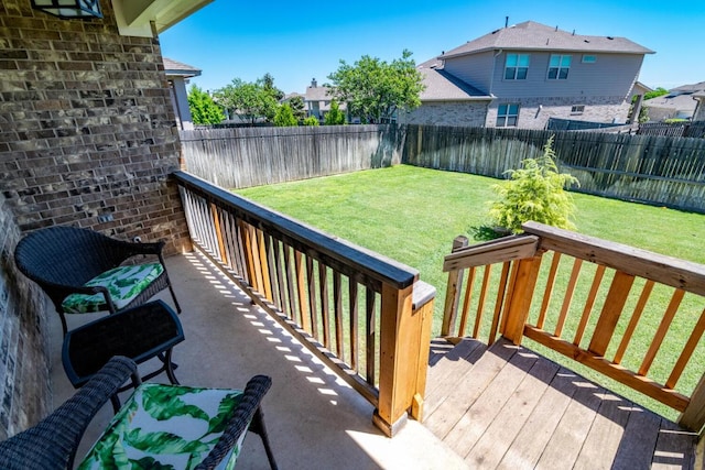 exterior space with a yard and a fenced backyard