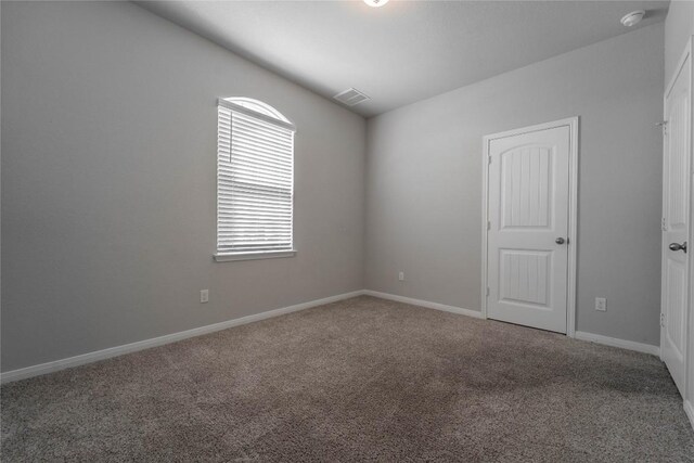 501 Naset Dr, Georgetown, TX 78626 - spare room featuring a smoke detector and carpet floors