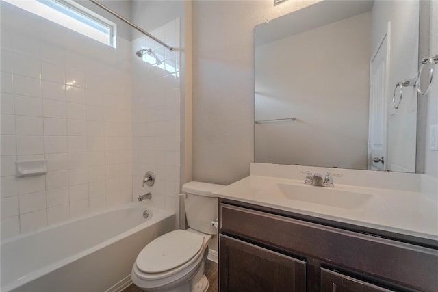 full bath with washtub / shower combination, toilet, and vanity