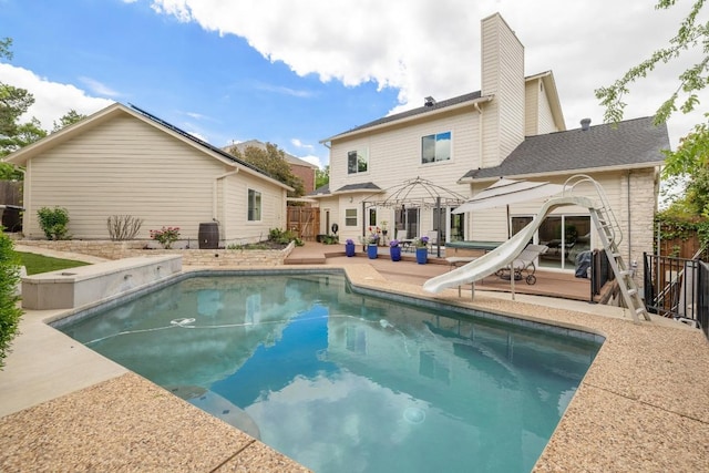 6659 Whitemarsh Valley Walk, Austin, TX 78746 - view of pool featuring a water slide and a patio