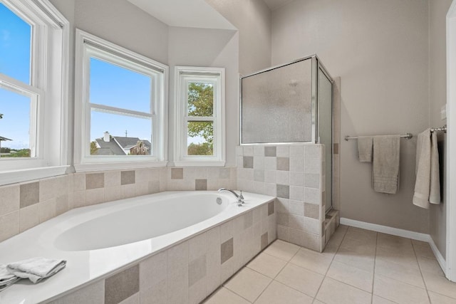 6659 Whitemarsh Valley Walk, Austin, TX 78746 - bathroom featuring a bath, a stall shower, tile patterned floors, and baseboards