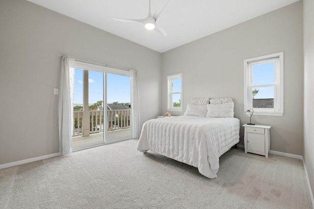 6659 Whitemarsh Valley Walk, Austin, TX 78746 - bedroom featuring access to exterior, multiple windows, light carpet, and baseboards