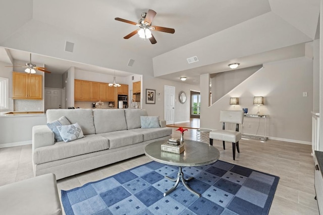 6659 Whitemarsh Valley Walk, Austin, TX 78746 - living room featuring a ceiling fan, lofted ceiling, and light tile patterned floors