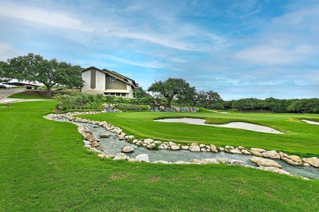 6659 Whitemarsh Valley Walk, Austin, TX 78746 - surrounding community featuring a lawn and golf course view