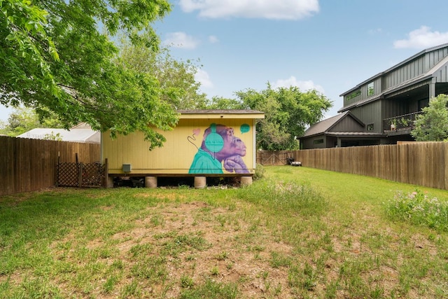 view of yard with a fenced backyard
