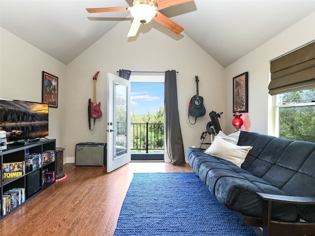 19904 Victoria Chase Rd, Lago Vista, TX 78645 - living area featuring a ceiling fan, wood finished floors, lofted ceiling, and baseboards