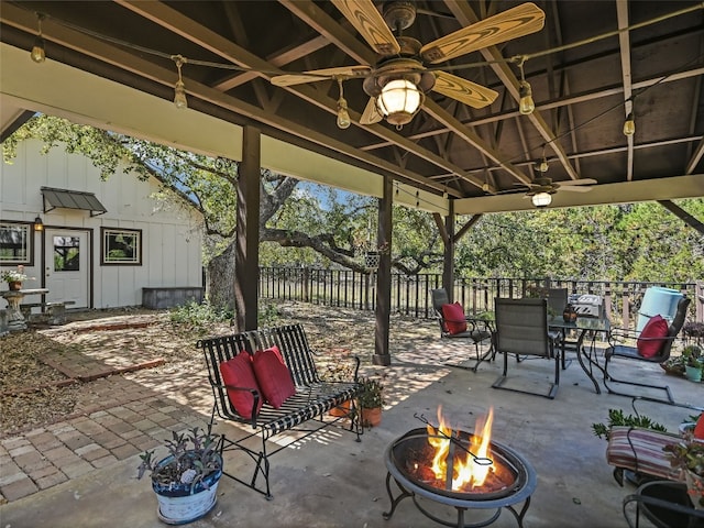19904 Victoria Chase Rd, Lago Vista, TX 78645 - view of patio / terrace with a fire pit, ceiling fan, and outdoor dining area