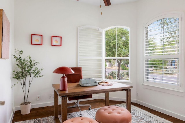home office featuring baseboards, dark wood-style flooring, and ceiling fan