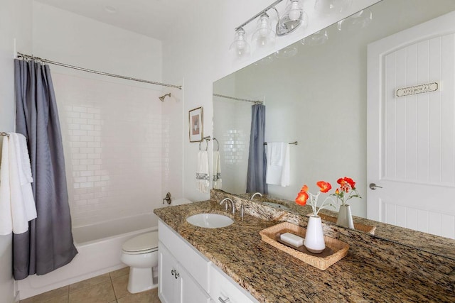bathroom featuring vanity, shower / tub combo with curtain, tile patterned floors, and toilet
