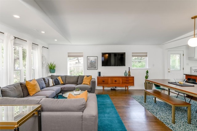 5323 Downs Dr, Austin, TX 78721 - living area featuring dark wood-style flooring and recessed lighting