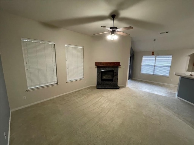 1709 Bush Coat Ln, Austin, TX 78754 - unfurnished living room with a premium fireplace, carpet flooring, a ceiling fan, and lofted ceiling