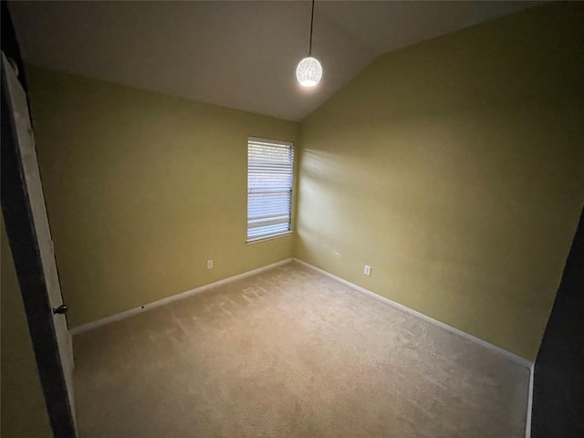 1709 Bush Coat Ln, Austin, TX 78754 - carpeted empty room featuring lofted ceiling and baseboards
