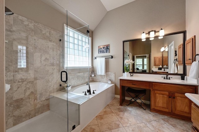 full bathroom with a bath, a shower stall, vanity, and plenty of natural light