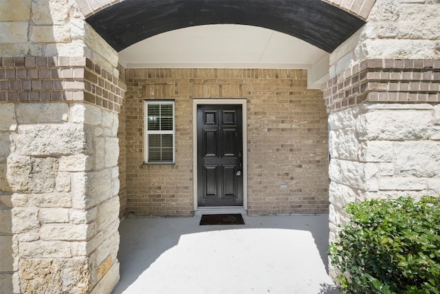 1812 Hidden Springs Path, Round Rock, TX 78665 - view of exterior entry featuring brick siding and stone siding