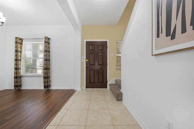 1812 Hidden Springs Path, Round Rock, TX 78665 - entryway with baseboards, stairs, and light tile patterned floors