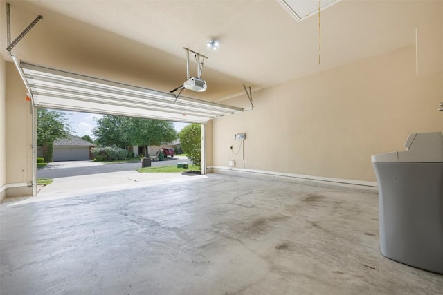 1812 Hidden Springs Path, Round Rock, TX 78665 - garage with a garage door opener and baseboards