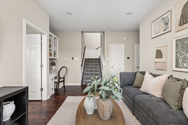 5710 Carry Back Ln, Austin, TX 78746 - living room with dark wood finished floors, stairs, and baseboards