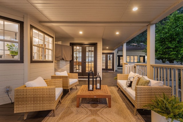 5710 Carry Back Ln, Austin, TX 78746 - wooden deck with french doors and an outdoor living space