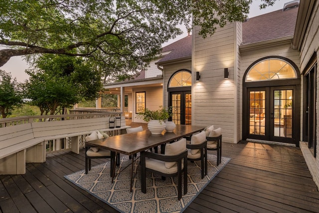 5710 Carry Back Ln, Austin, TX 78746 - wooden terrace with french doors and outdoor dining space