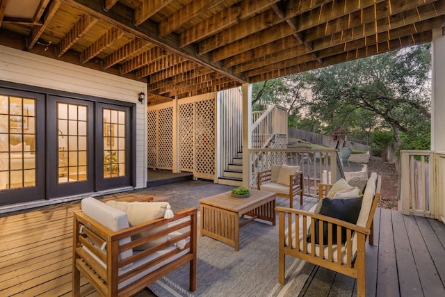 5710 Carry Back Ln, Austin, TX 78746 - wooden deck with an outdoor hangout area, stairs, and french doors
