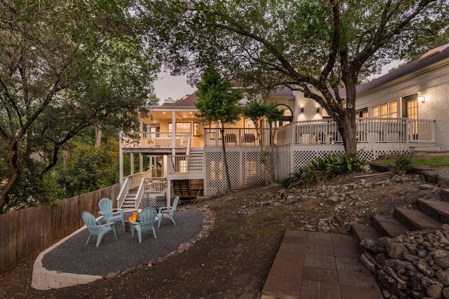 5710 Carry Back Ln, Austin, TX 78746 - view of yard featuring stairway, an outdoor fire pit, a wooden deck, and a patio