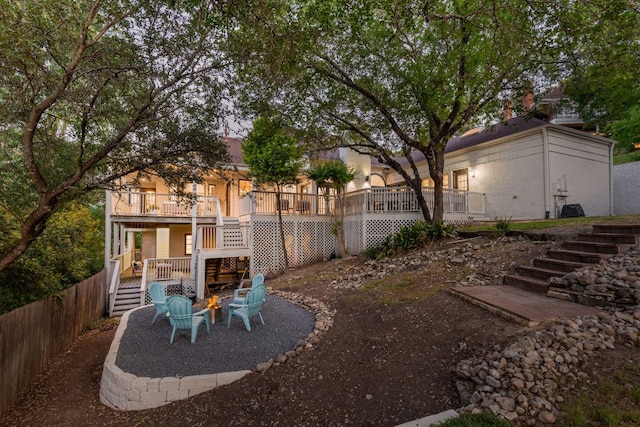 5710 Carry Back Ln, Austin, TX 78746 - view of yard with stairway, an outdoor fire pit, and a deck